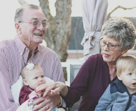 Grandparents spending time with grandchildren outdoors | Associated Nephrology Consultants | Maplewood MN